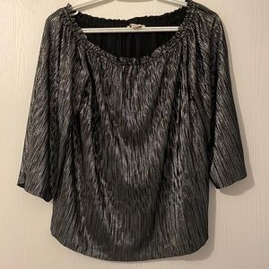 Shiny, stretchy off the shoulder top